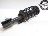 Front shock absorber with coil spring