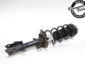 Front shock absorber with coil spring