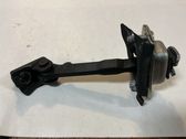 Front door check strap stopper