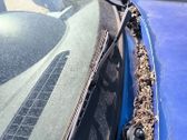 Front wiper blade arm