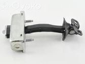 Front door check strap stopper