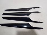 Front door trim bar