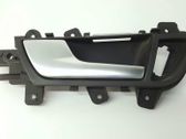 Manecilla interna puerta delantera