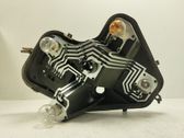 Tail light bulb cover holder