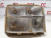 Tail light bulb cover holder