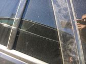 Ventanilla de ventilación de la puerta trasera