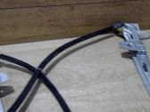 Mecanismo para subir la puerta delantera sin motor
