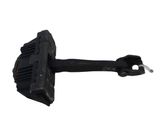 Front door check strap stopper