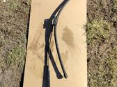 Front wiper blade arm