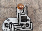 Tail light bulb cover holder