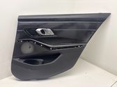 Rear door card panel trim