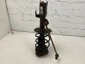 Front shock absorber with coil spring