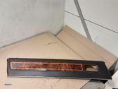 Front door trim bar