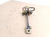 Rear door check strap stopper