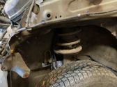 Front shock absorber with coil spring