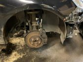 Front shock absorber with coil spring