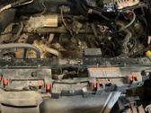 Top upper radiator support slam panel