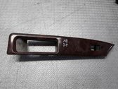 Front door interior handle trim
