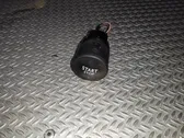 Bouton poussoir de démarrage du moteur