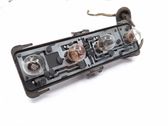 Tail light bulb cover holder