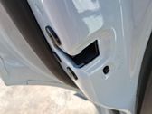 Cerradura de puerta trasera