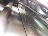 Regulador de puerta delantera con motor