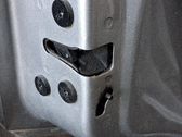Cerradura de puerta trasera