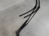 Front wiper blade arm