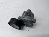 Alternator belt tensioner