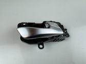 Rear door interior handle trim