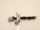 Front door check strap stopper