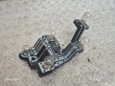 Tail light bulb cover holder