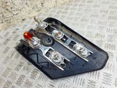 Tail light bulb cover holder