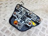 Tail light bulb cover holder