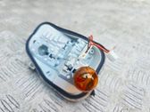 Tail light bulb cover holder