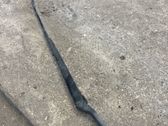 Front wiper blade arm