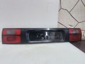 Trunk door license plate light bar