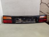 Trunk door license plate light bar