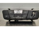 Bouton commande réglage hauteur de phares