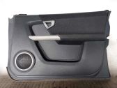 Front door card panel trim