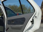 Rear door manual window regulator