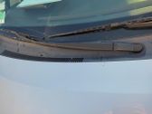 Front wiper blade arm