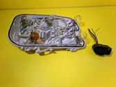 Tail light bulb cover holder