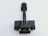 Front door check strap stopper