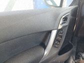 Regulador manual de la ventanilla delantera