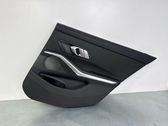 Rear door card panel trim