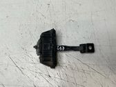 Front door check strap stopper