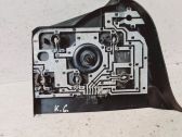 Tail light bulb cover holder
