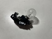 Tail light bulb cover holder