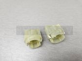 Tail light bulb cover holder